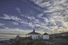 Clouds and Abandoned Lighthouse  Maine Coast